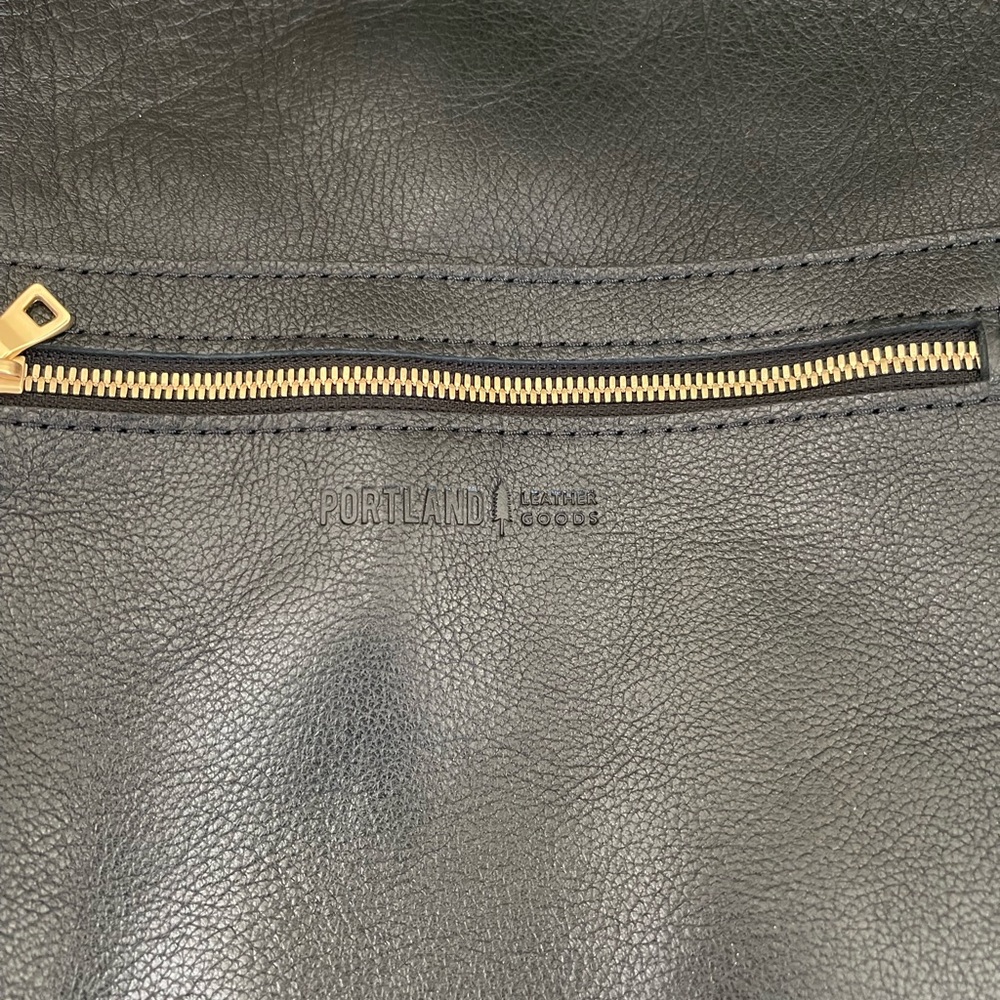 Leather laptop backpack